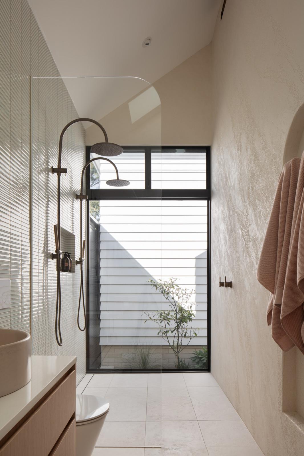 Twin rain showers to courtyard — Bathroom Renovations plumbing job in Gerringong by a licensed Shellharbour plumber