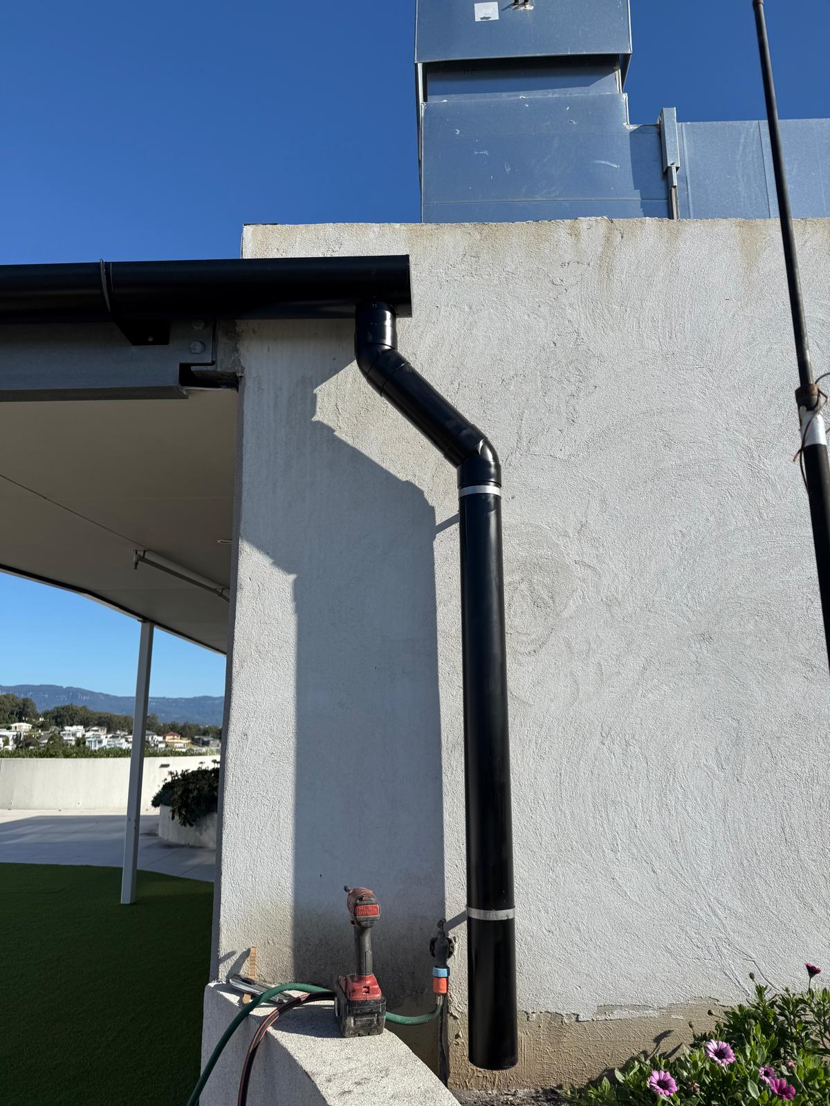 Commercial downpipe — close-up — plumbing work completed in Shell Cove by Shellharbour Plumbing (licensed Illawarra plumber)