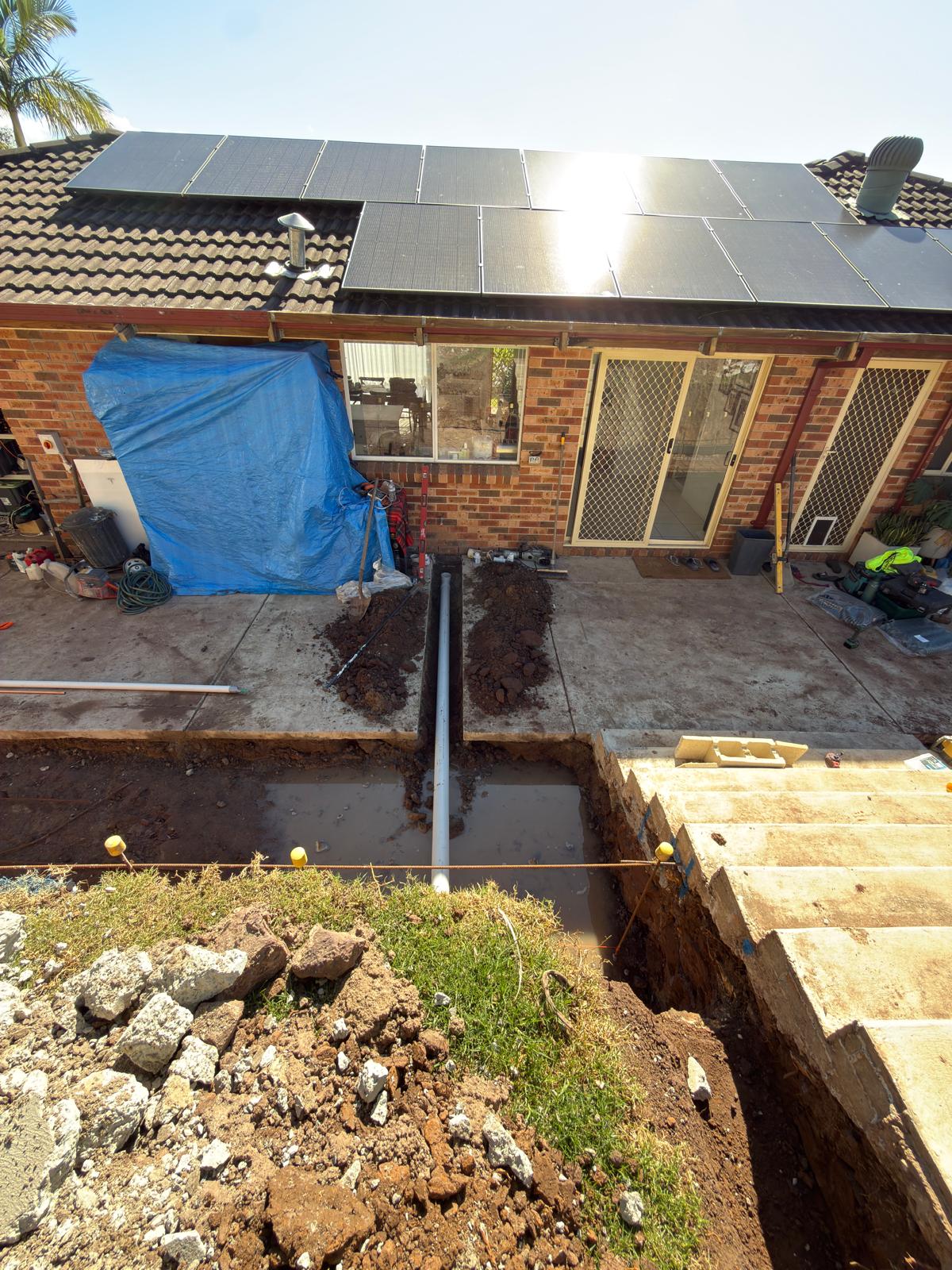 Sewer line trench — yard to street — Blocked Drains plumbing job in Albion Park by a licensed Shellharbour plumber