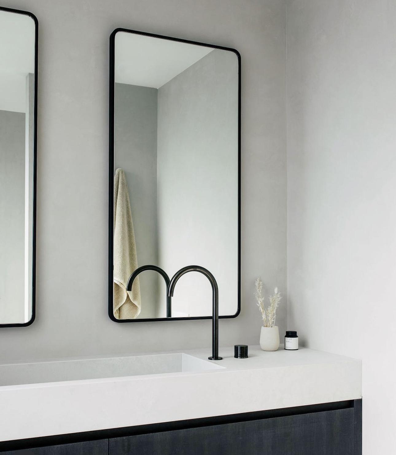 Concrete vanity with twin black mixers — Bathroom Renovations plumbing job in Shell Cove by a licensed Shellharbour plumber