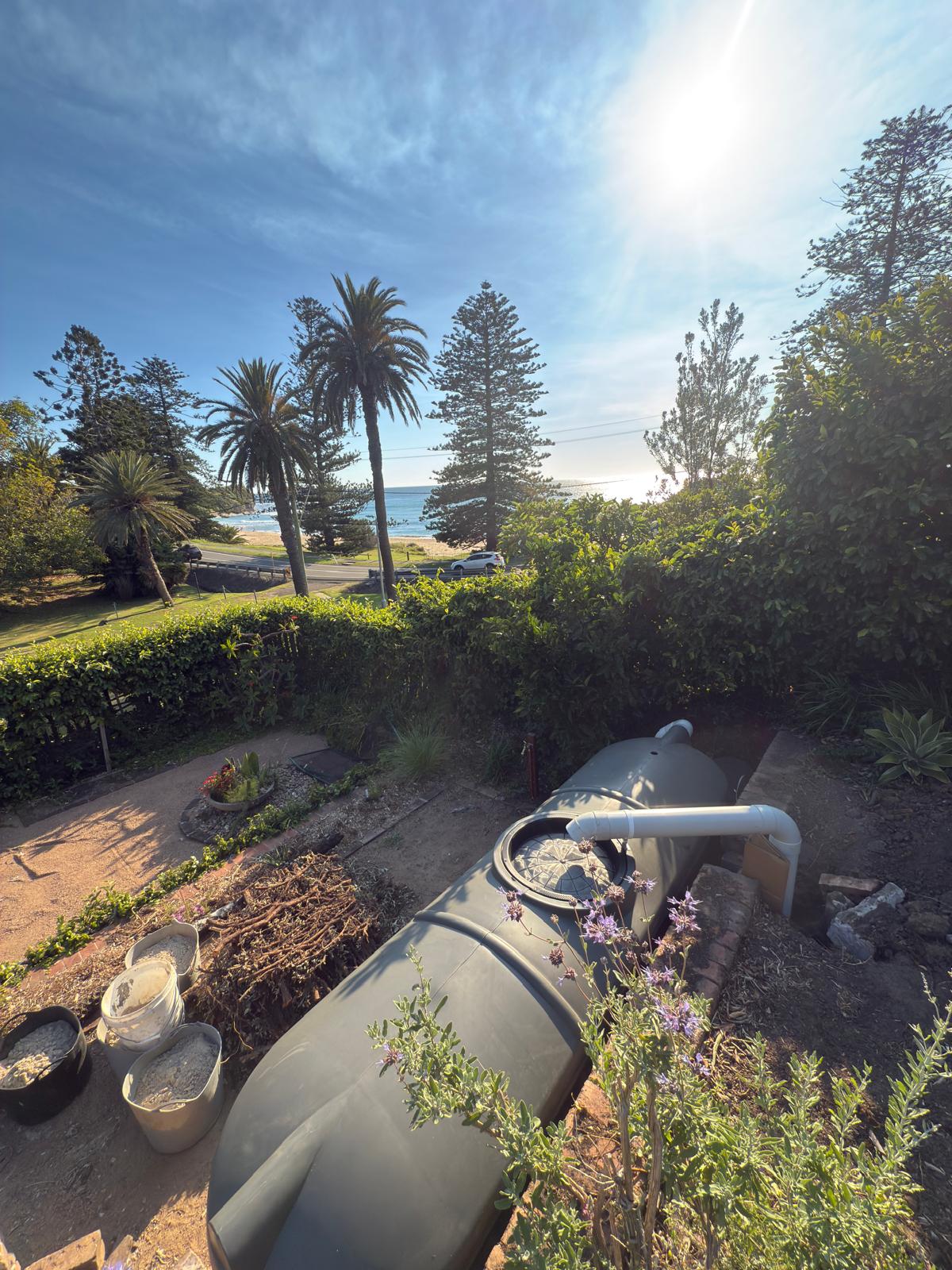 Seaside rainwater tank — ocean-view install — plumbing work completed in Gerringong by Shellharbour Plumbing (licensed Illawarra plumber)