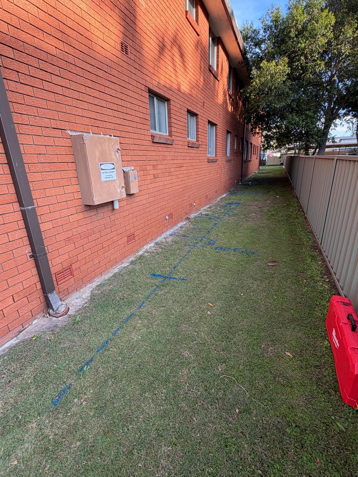 Stormwater trench set-out — unit block — plumbing work completed in Warilla by Shellharbour Plumbing (licensed Illawarra plumber)