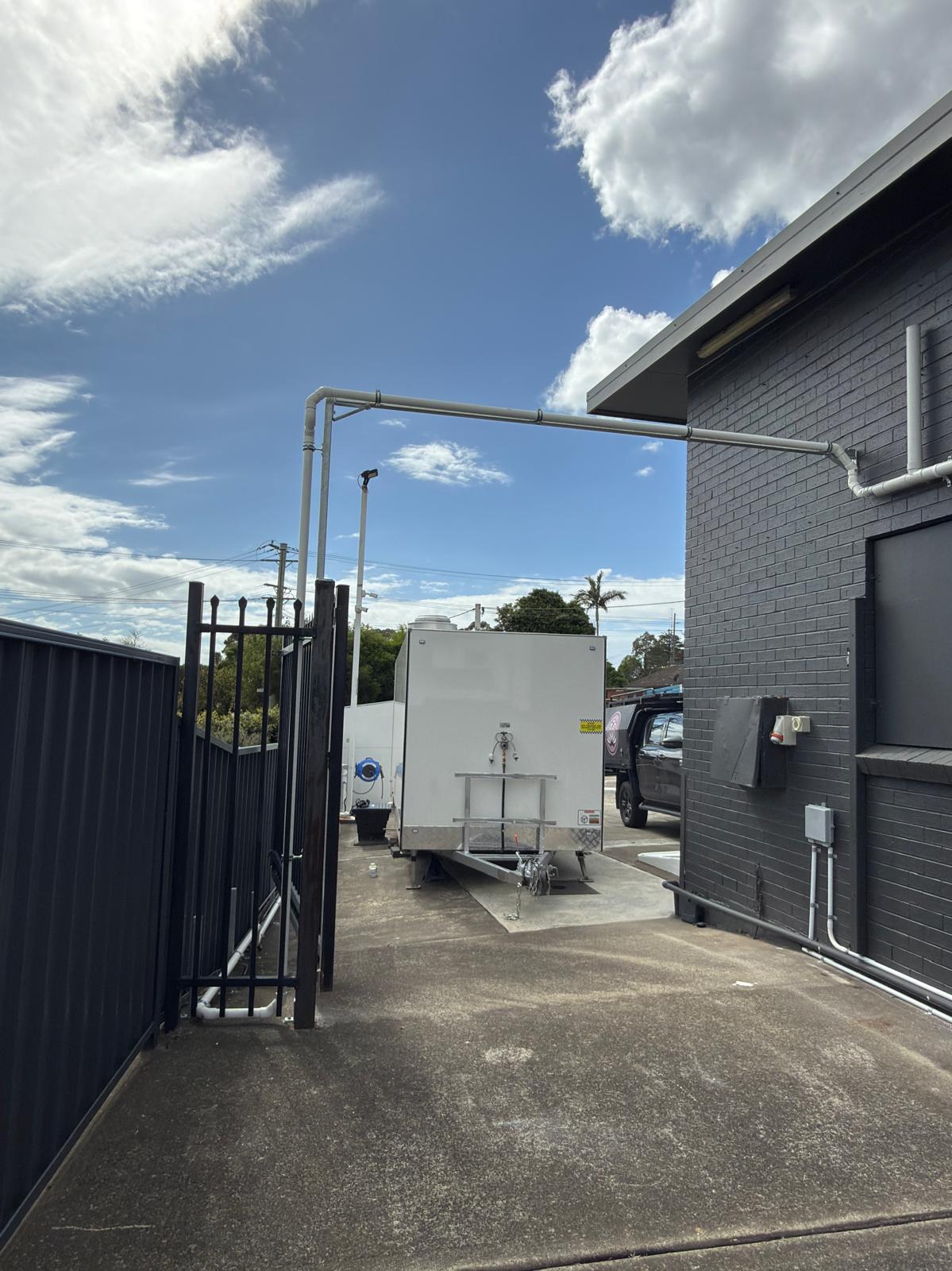 Overhead trade waste line — food truck pump-out — plumbing work completed in Albion Park by Shellharbour Plumbing (licensed Illawarra plumber)