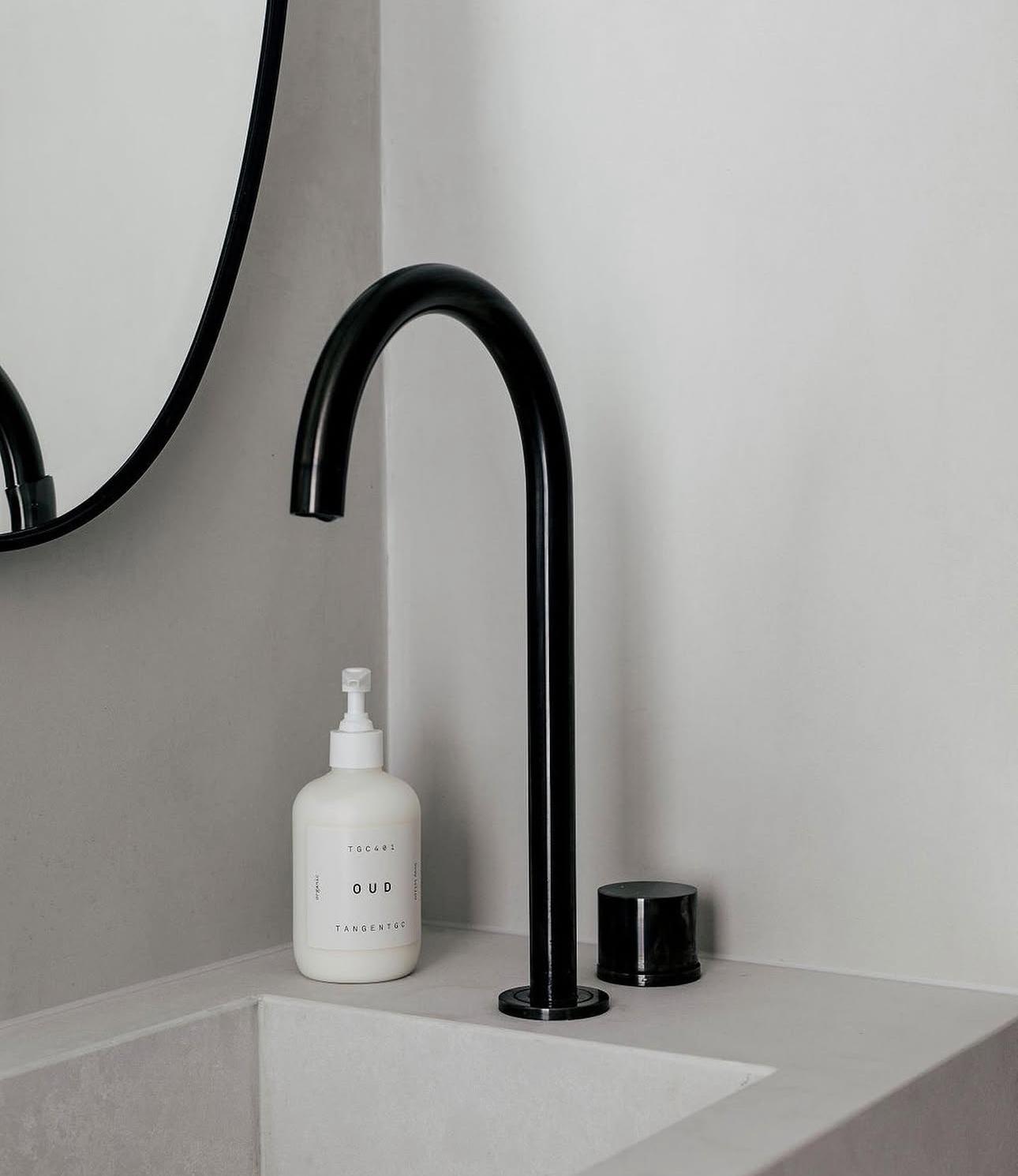 Black gooseneck basin mixer — Bathroom Renovations plumbing job in Gerringong by a licensed Shellharbour plumber