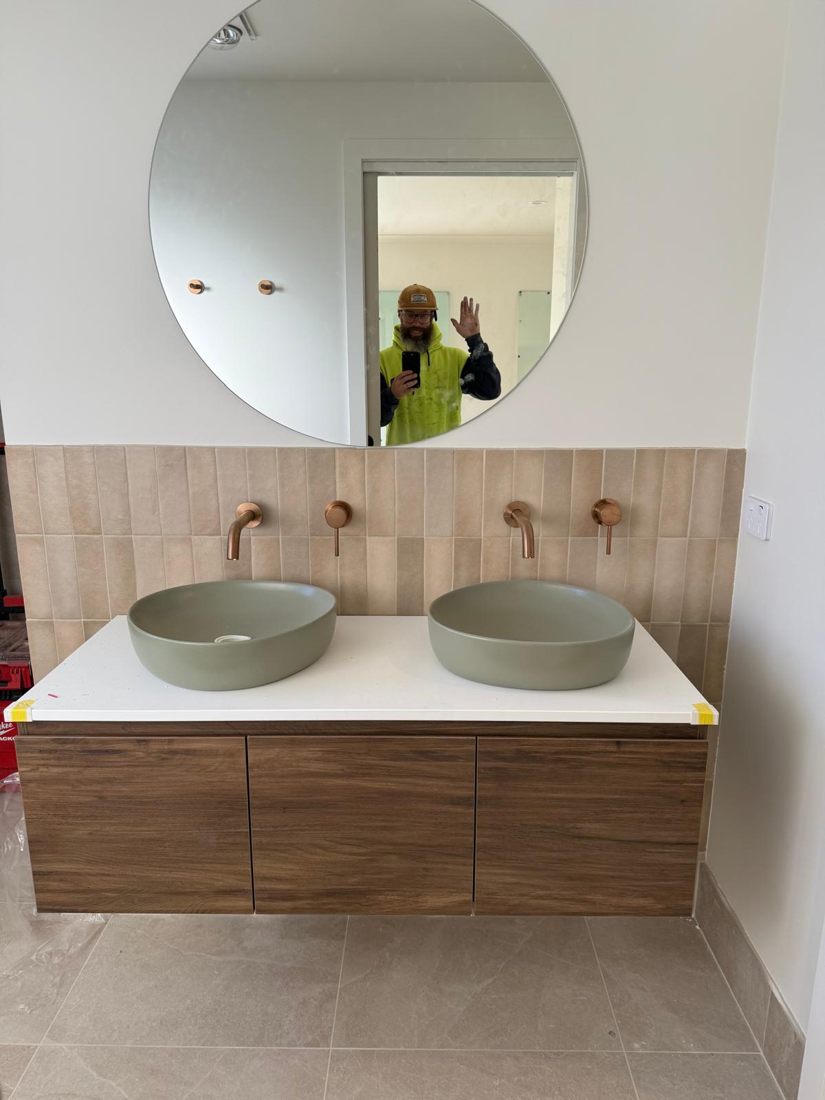 Double vanity — sage basins & brushed copper — plumbing work completed in Shell Cove by Shellharbour Plumbing (licensed Illawarra plumber)