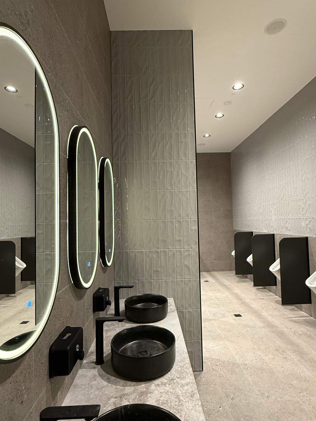 Commercial amenities — matte black fit-out — Commercial Plumbing plumbing job in Albion Park by a licensed Shellharbour plumber