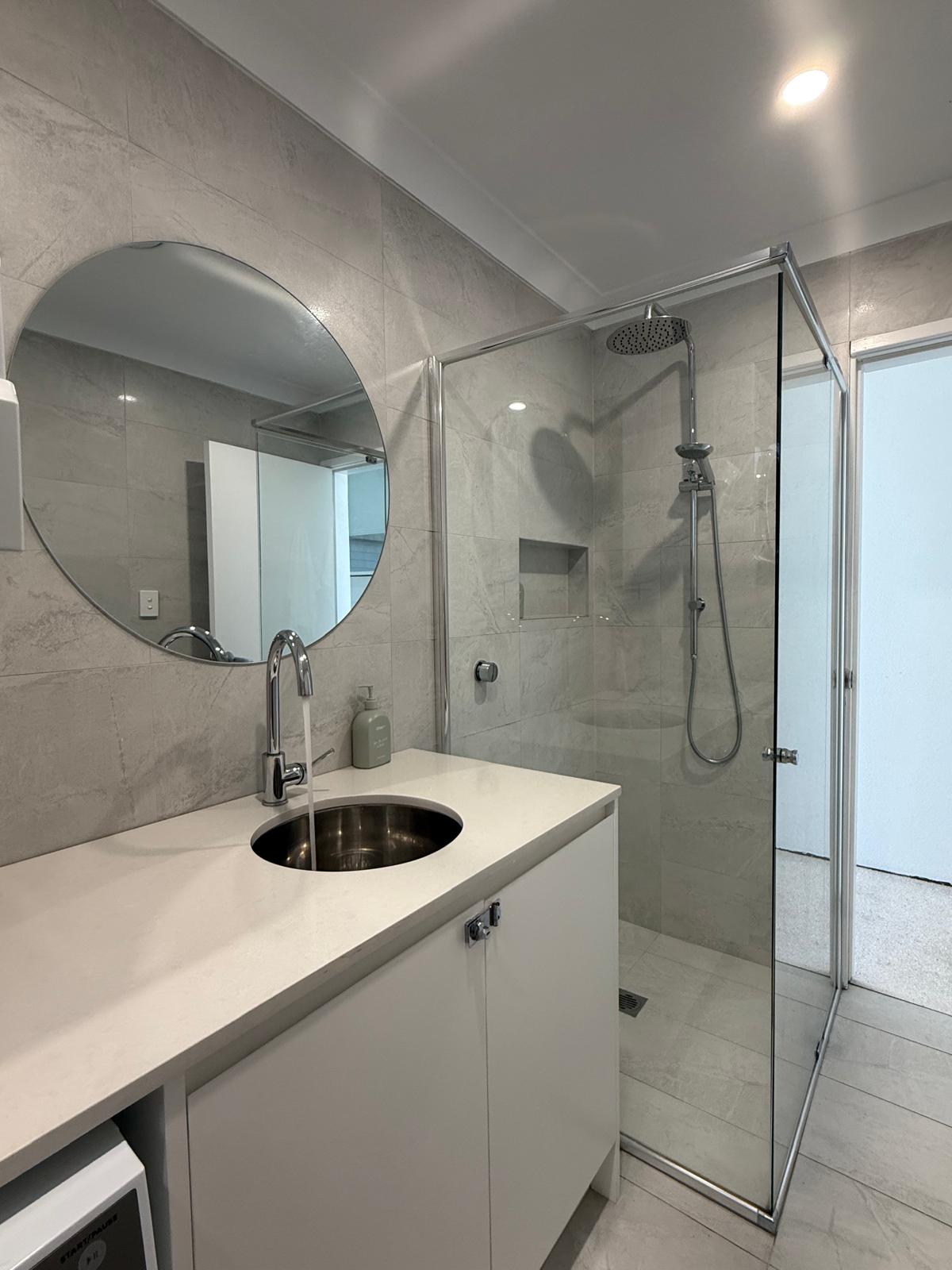 Laundry & bathroom combo refresh — plumbing work completed in Oak Flats by Shellharbour Plumbing (licensed Illawarra plumber)