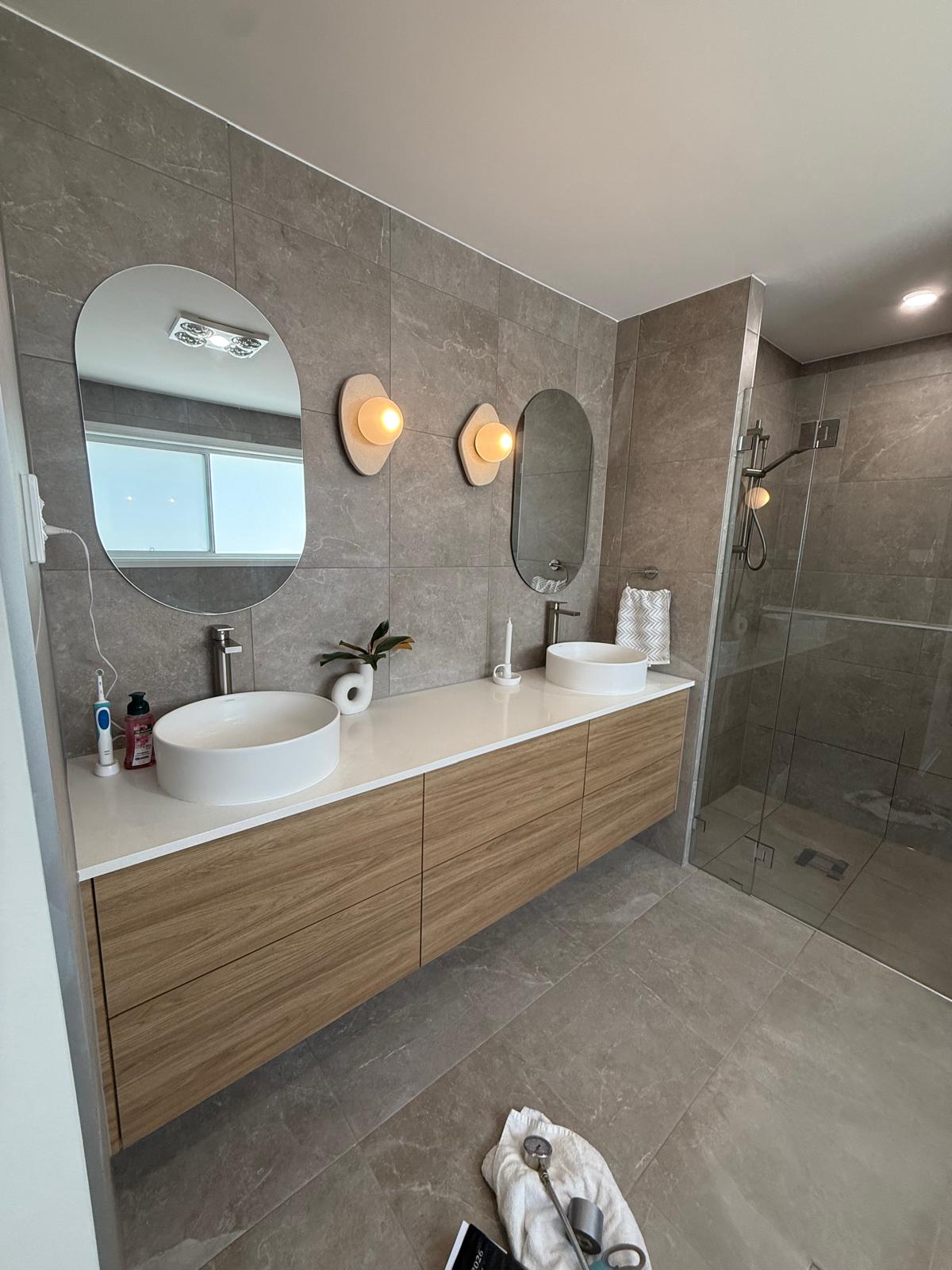 Ensuite — double vanity & walk-in shower — plumbing work completed in Gerringong by Shellharbour Plumbing (licensed Illawarra plumber)
